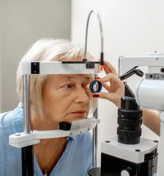 Caucasian senior woman eye exam